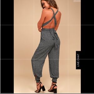 Lulu’s Take a Trip Black Print Halter Jumpsuit